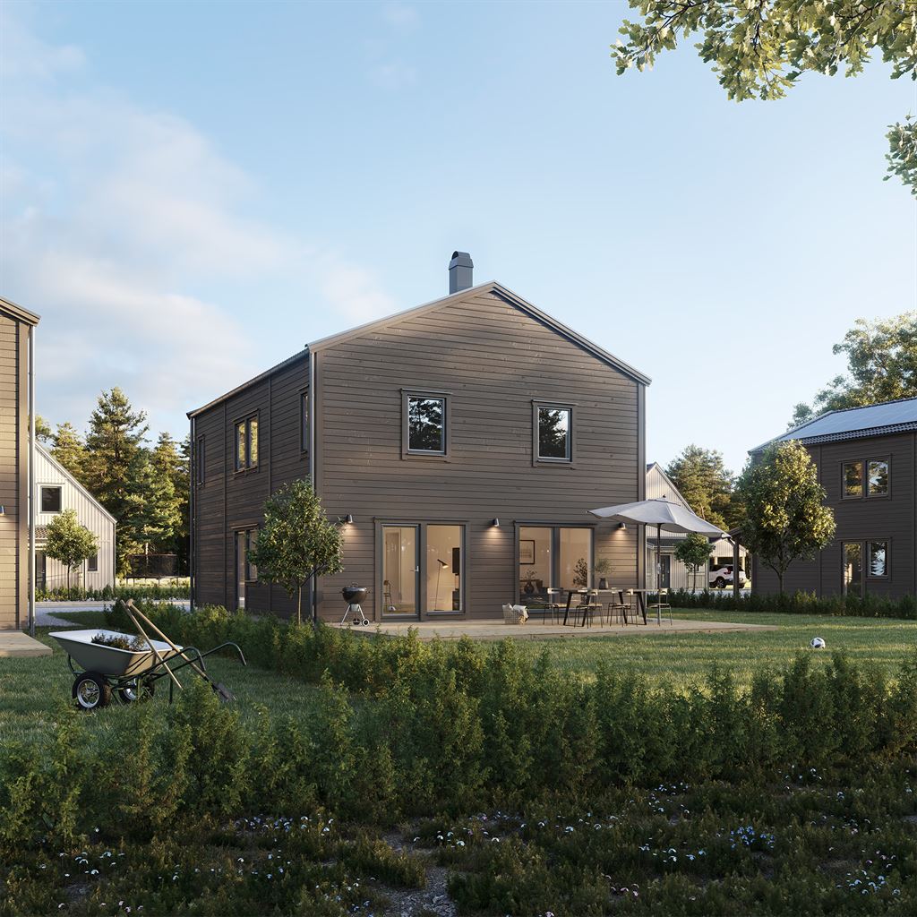 Naturfärgat Villa Ekbacken modern med antracitfärgade fönster & plåtar